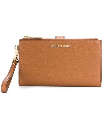 Michael Kors glossy faux leather wristlet for women Brown