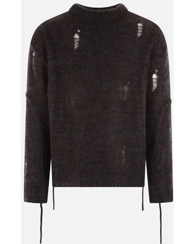 ANDERSSON BELL Jumpers - Black