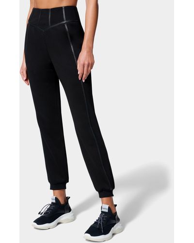 Bebe Track pants and sweatpants for Women | Online Sale up to 54% off | Lyst