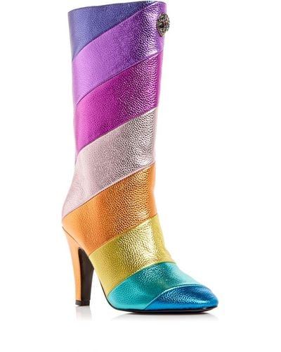 white and rainbow football boots