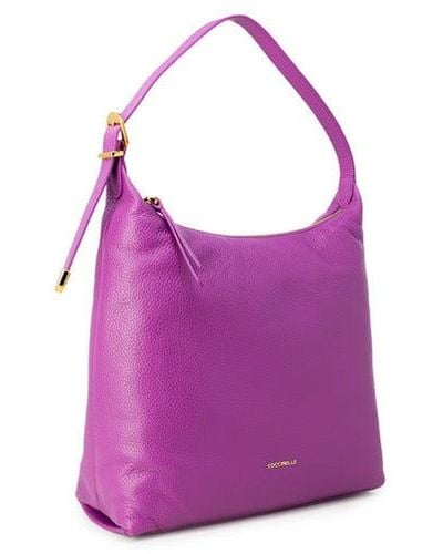Purple Coccinelle Tote bags for Women Lyst