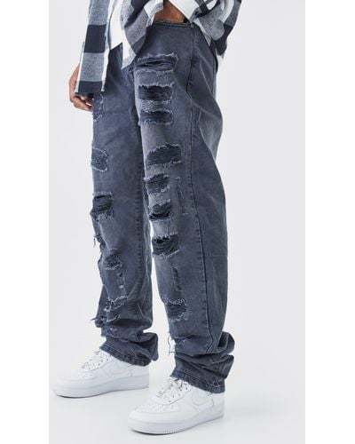 BoohooMAN Tall lockere Jeans mit extremen Rissen - Blau
