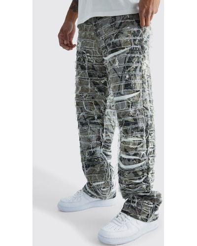 BoohooMAN Relaxed Heavily Distressed Camo Trouser - Gray