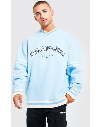 BoohooMAN Oversize Sweatshirt mit V-Ausschnitt und Print - Blau