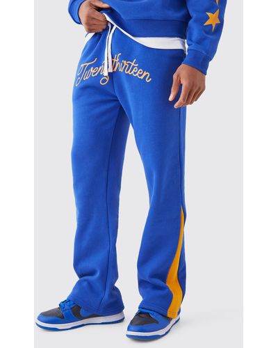 BoohooMAN Varsity Embroidered Contrast Gusset Jogger - Blue