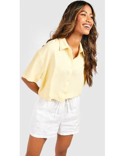 https://cdna.lystit.com/400/500/tr/photos/boohoo/2633b4a1/boohoo-designer-Yellow-Linen-Mix-Oversized-Boxy-Cropped-Short-Sleeve-Shirt.jpeg