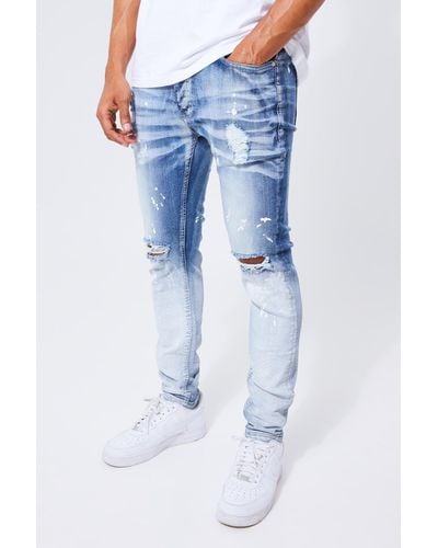 BoohooMAN Skinny Stretch Paint Splat Ombre Jeans - Blue