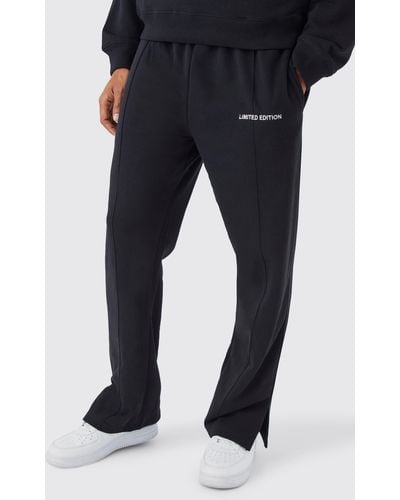 BoohooMAN Lockere Jogginghose mit geteiltem Saum - Blau