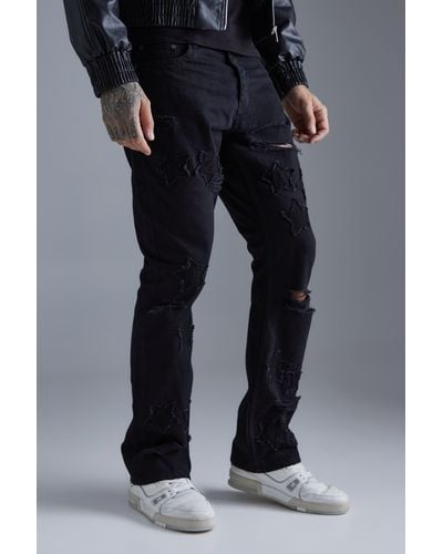 Boohoo Tall Slim Rigid Flare Star Applique Jeans - Black