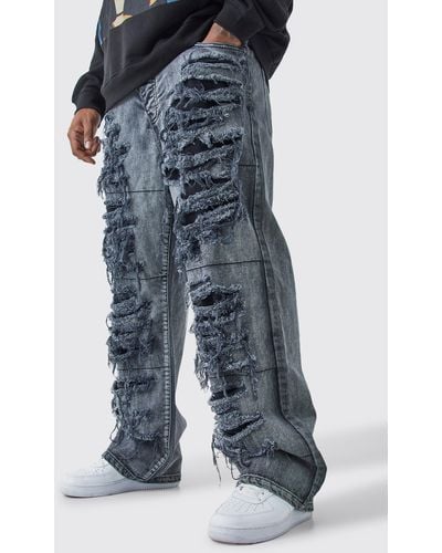 BoohooMAN Plus lockere Jeans mit extremen Rissen - Blau