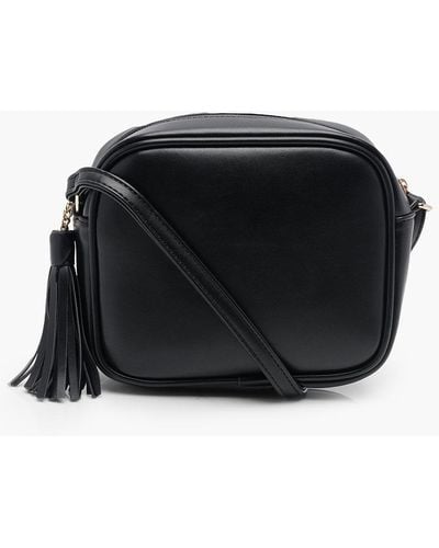 Boohoo Pu Zip Around Crossbody Bag With Tassel - Black