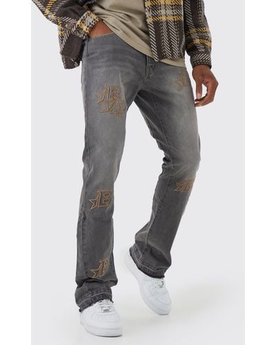 BoohooMAN Zerrissene Slim-Fit Jeans mit Applikation - Grau