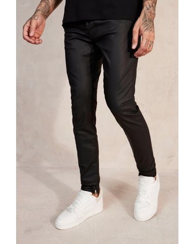 BoohooMAN Skinny Stacked Zip Hem Coated Jeans - Black