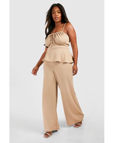 ASYMMETRIC RUFFLE SKIRTED JUMPSUIT – Thick