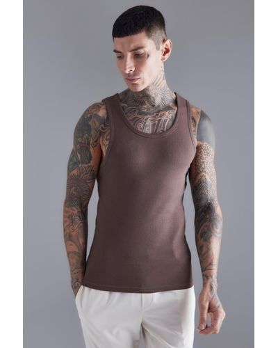 BoohooMAN Muscle Fit Ribbed Vest - Brown