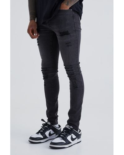 Boohoo Super Skinny Jeans With All Over Rips - Black