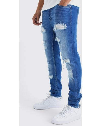 BoohooMAN Skinny Stretch Stacked Rhinestone Ripped Jeans - Blue