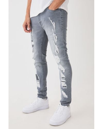 Boohoo Skinny Stretch All Over Ripped Grey Jeans - Blue
