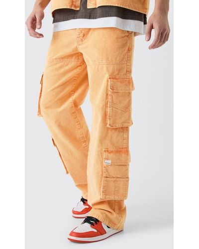 BoohooMAN Baggy Multi Pocket Acid Wash Cord Pants In Orange