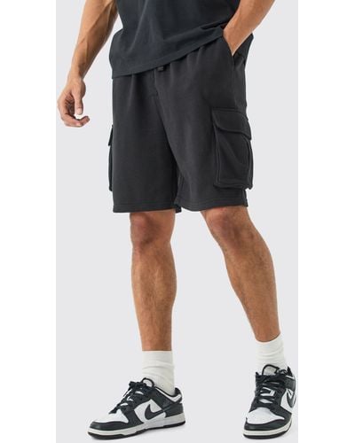BoohooMAN Oversized Drop Crotch Cargo Pocket Jersey Shorts - Black
