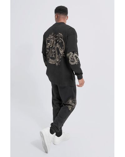 Boohoo Oversize T-Shirt Trainingsanzug mit Drachen-Print - Schwarz