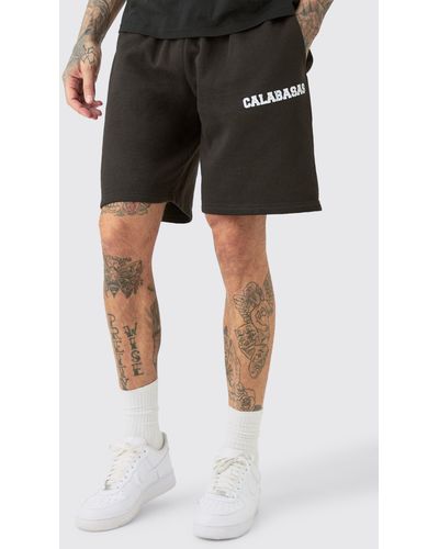 BoohooMAN Tall Loose Fit Varsity Jersey Shorts - Black