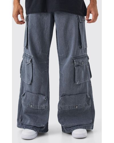 BoohooMAN Lockere Jeans mit Cargo-Taschen und Acid-Waschung - Blau