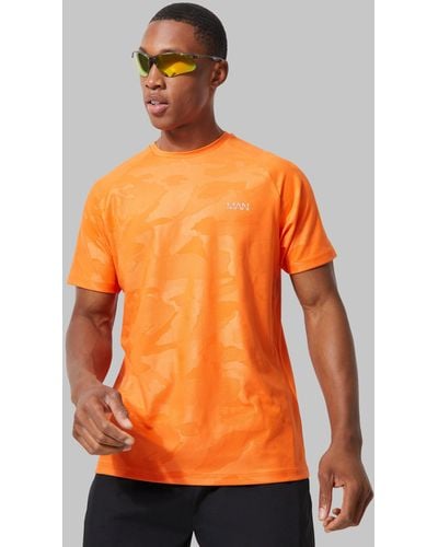 Boohoo Camiseta Man Active De Ranglán Resistente Con Estampado De Camuflaje - Naranja