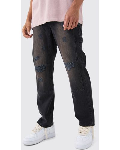 BoohooMAN Relaxed Rigid Ripped Knee Carpenter Jeans In Washed Black - Schwarz