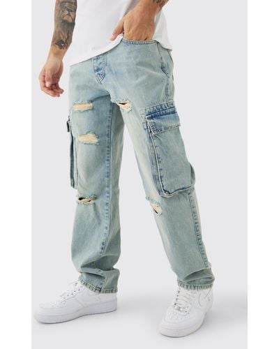 BoohooMAN Relaxed Rigid Ripped Cargo Pocked Denim Jean In Light Blue