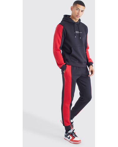 Nike sweat deals suits red