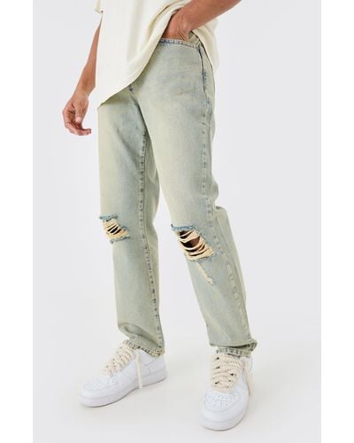 BoohooMAN Relaxed Rigid Ripped Knee Jeans In Antique Blue