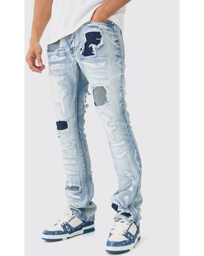 Boohoo Slim Rigid Flare Stacked Rip & Repair Jeans In Ice Blue