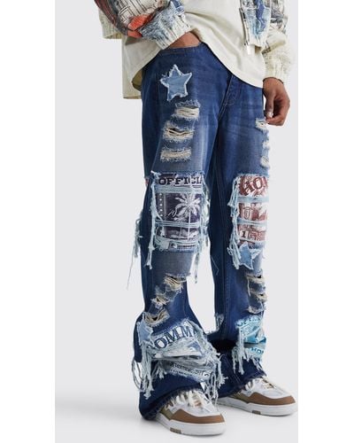 BoohooMAN Relaxed Rigid Flare Applique Jeans - Blue