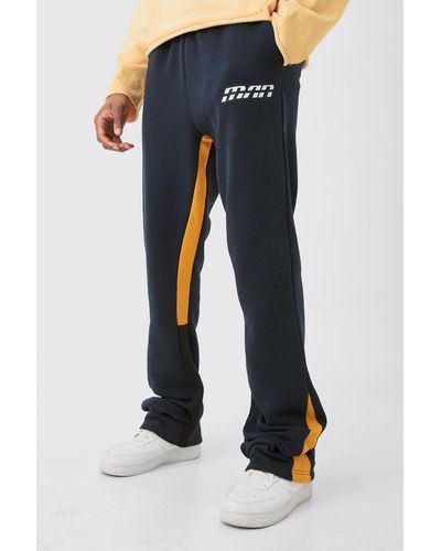 BoohooMAN Tall Slim Fit Flare Colour Block Gusset Joggers In Navy - Blau