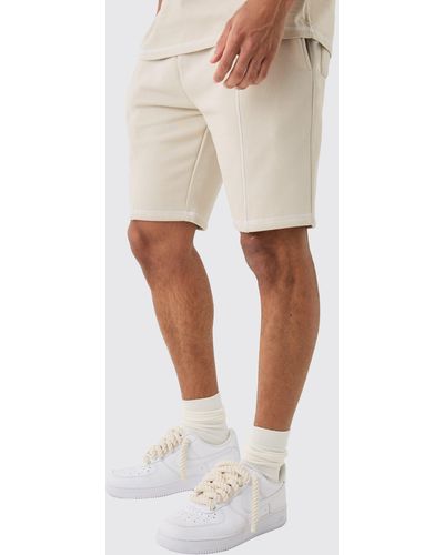 BoohooMAN Loose Contrast Stitch Embroided Shorts - Natural