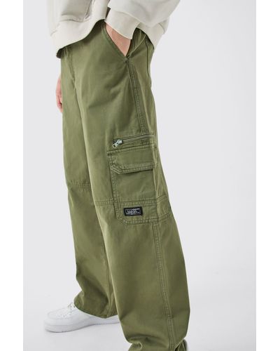 BoohooMAN Fixed Waist Cargo Zip Trousers With Woven Tab - Green