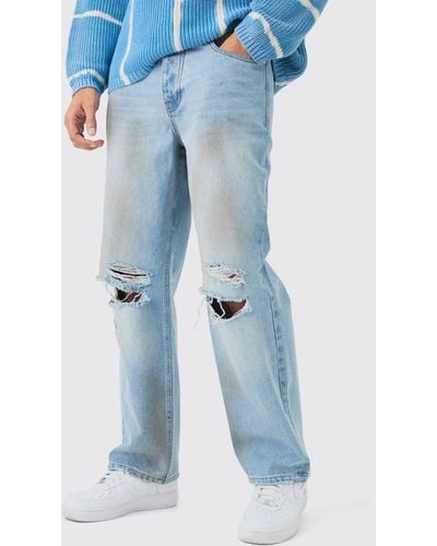 BoohooMAN Baggy Rigid Ripped Knee Dirty Wash Jeans In Light Blue