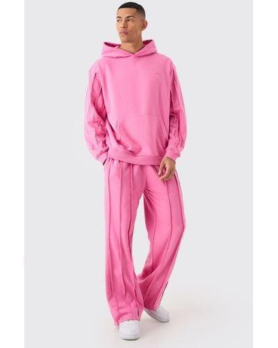 BoohooMAN Oversized Raw Seam Man Sig Embroidered Hooded Tracksuit - Pink