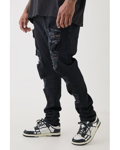 BoohooMAN Plus Skinny Stretch All Over Rip Jeans - Black