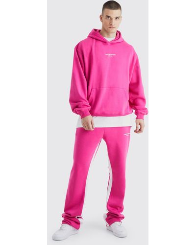 BoohooMAN Tall kastiger Oversize Limited Trainingsanzug mit Kapuze - Pink