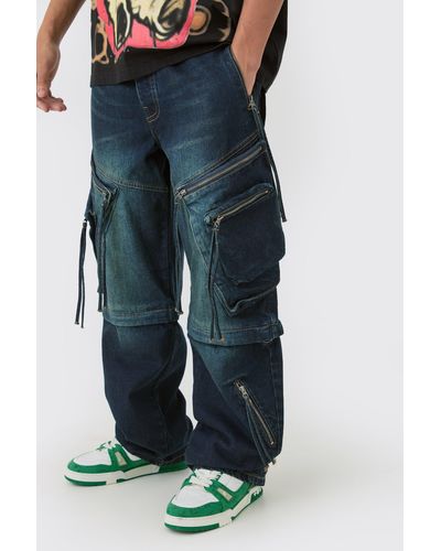 BoohooMAN Baggy Rigid Zip Off Leg Cargo Pocket Strap Denim Jean In Indigo - Blue