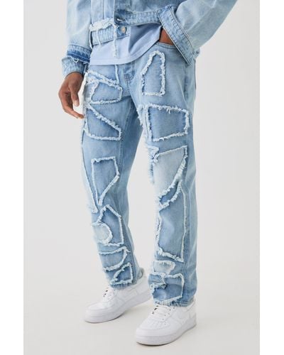 BoohooMAN Distressed Patchwork Relaxed Rigid Jeans In Light Blue