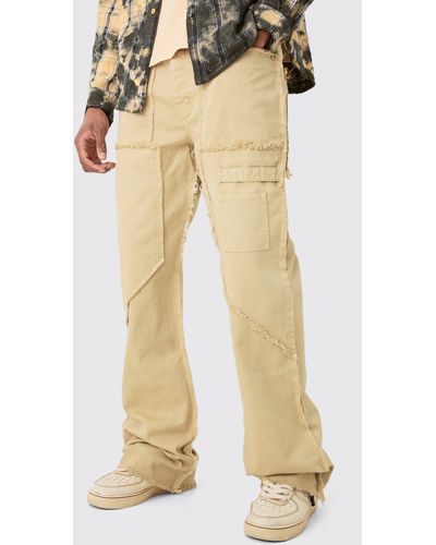 BoohooMAN Tall Fixed Waist Washed Relaxed Raw Edge Twill Flare Trousers - Natural