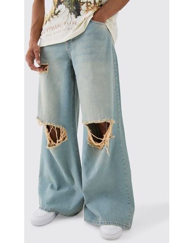 BoohooMAN Extreme Baggy Rigid Exploded Knee Rip Denim Jean In Light Blue