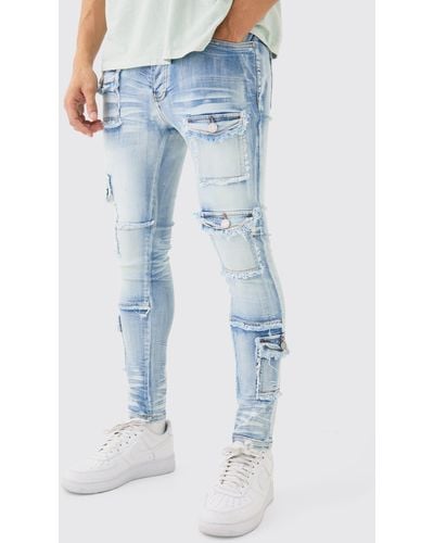 BoohooMAN Super Skinny Stretch Distressed Multi Pocket Jeans In Light Blue