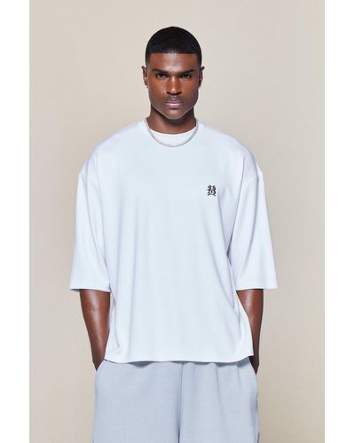 BoohooMAN Oversized Half Sleeve Interlock Metal Branded T-shirt - White