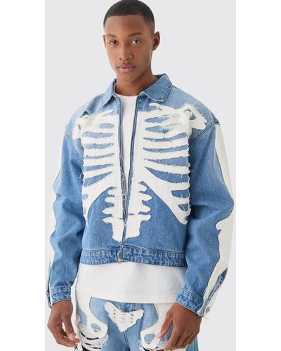 BoohooMAN Boxy Fit Skeleton Applique Distressed Jean Jacket In Light Blue