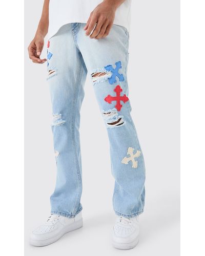 BoohooMAN Slim Rigid Flare Applique Jeans In Ice Blue