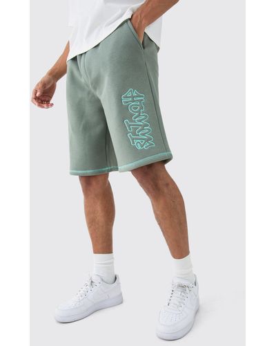 BoohooMAN Oversized Contrast Stitch Applique Shorts - Green